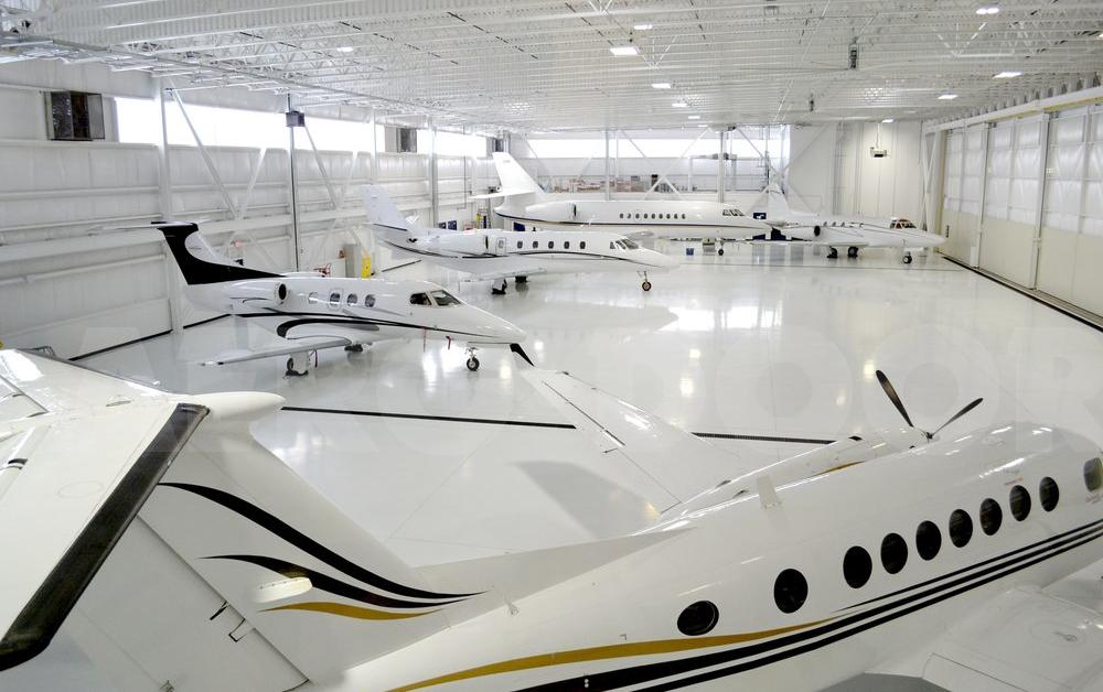 airplane hangar with private jets