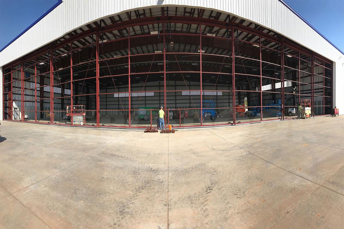 A finished Hangar door system. Note sheeting and trim is by others.